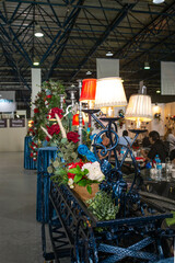 Rustic wooden cabin interior with bed, sofa, and armoire