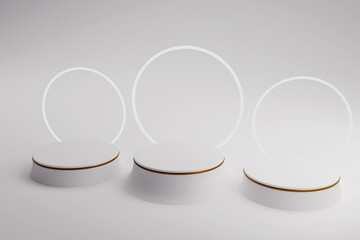 3D white pedestal podium set for cosmetic product display presentation.