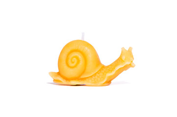 Snail bees wax candle on white background