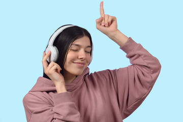 Young beautiful woman listening to music 