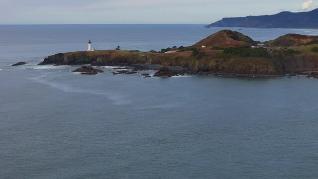 Yaquina Head Lighthouse- Cape Foulweather. Crane down shot Video Pacific Northwest
