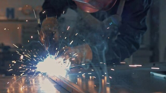 Bright sparks close-up welding with a welding 