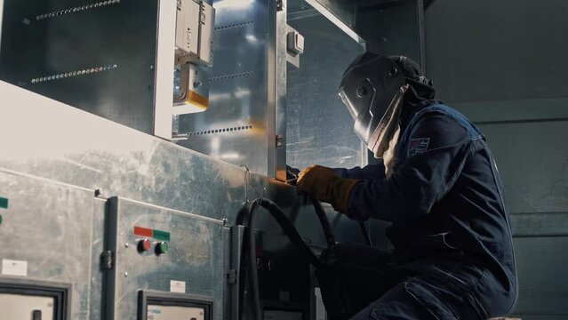 Welder at a plant for the production of equipment 