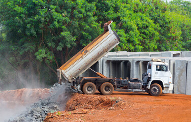 Truck dumping rubble