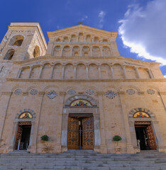 Fototapeta na wymiar Cityscape of Cagliari in Sardinia, Italy: Neo-Romanesque façade of Cathedral dedicated to the Virgin Mary and to Saint Cecilia.