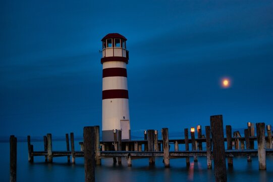Lighthouse at Podersdorf at the lake "Neusiedler See" at full moon.