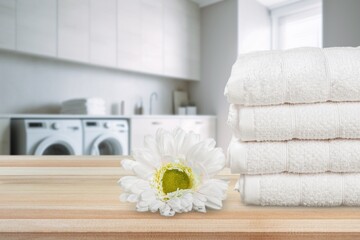 Obraz na płótnie Canvas Stack of clean fresh aroma laundry in bathroom