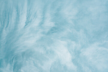 Ethereal blue cloud texture for serene spring backgrounds