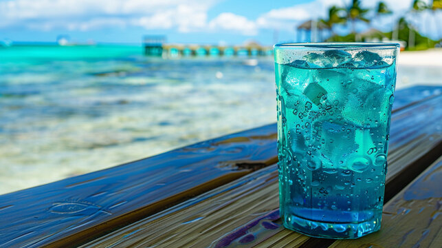 cocktail in the beach, image with copy space, one glass in the corner. A perfect tropical beach 