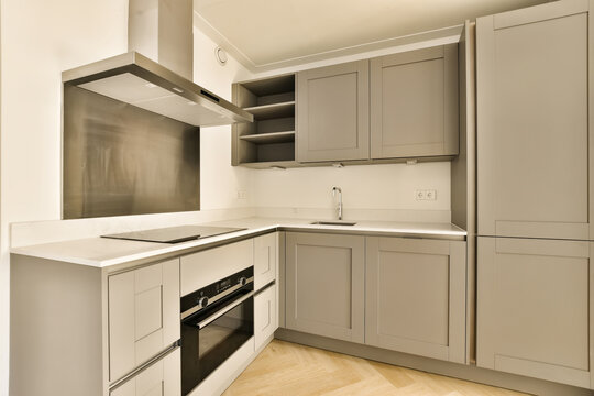 Modern kitchen interior with integrated appliances