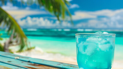 Fototapeta na wymiar cocktail on the beach under a palm tree with copy space