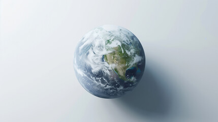 Earth globe on a plain white background for Earth Day. Holiday concept. Image for an environmental organization. Banner with copy space. 