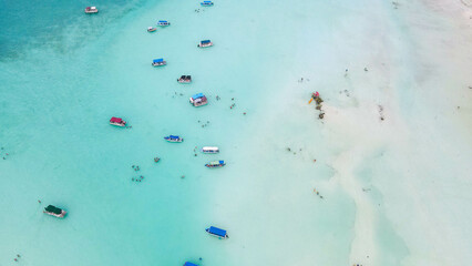 Boats and kayaks in the Bacalar Lagoon, near Cancun in Riviera Maya, Mexico