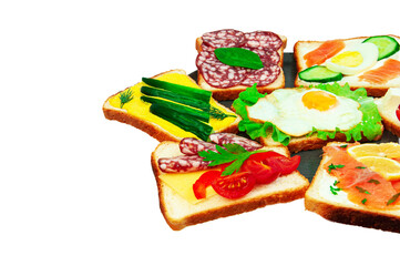 appetizing sandwiches in a gray plate on a white background. slices of bread with vegetables and meat in a plate on a light texture	