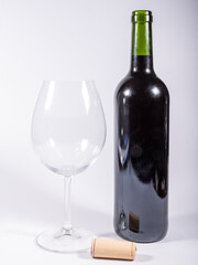 Spanish wine bottle with glass