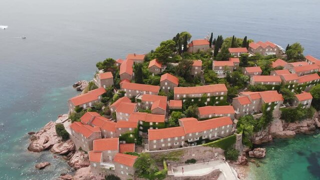 Sveti Stefan. Montenegro. Fantastic aerial view of the beach and Sveti Stefan island. Beautiful architecture and the blue Adriatic Sea.