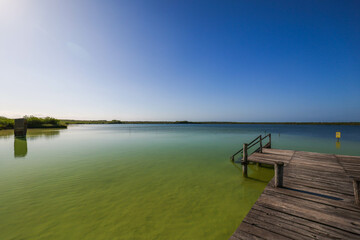 Fototapeta na wymiar Muelle, one of Beautiful blue hole Kaan Luum lagoon in Tulum, Quintana Roo in Mexico.