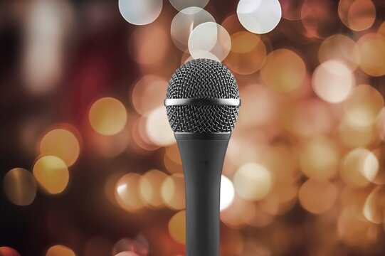 Microphone On The Stage With bright Blurred Lights