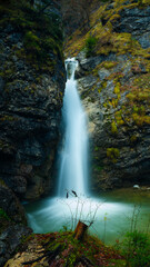 Fototapeta na wymiar Long exposure at a small waterfall in Austria.