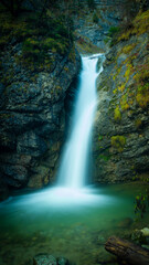 Fototapeta na wymiar Long exposure at a small waterfall in Austria.