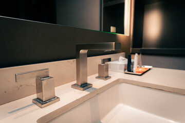 hotel room bathroom sink and faucet