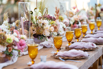 A centerpiece is a central decorative object, often flowers, candles or fruit, and is an important part of the wedding reception decoration.