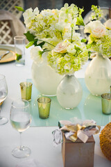 A centerpiece is a central decorative object, often flowers, candles or fruit, and is an important part of the wedding reception decoration.