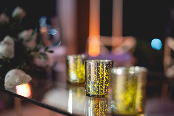 A centerpiece is a central decorative object, often flowers, candles or fruit, and is an important part of the wedding reception decoration.