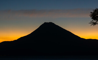 Volcano at sunset in Lake Atitlán