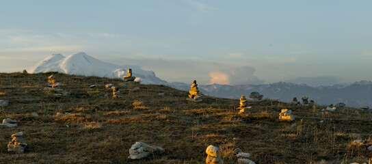Russia, the Elbrus region. Stunning dawn view of the Caucasus mountains from the cliffs of the Bolshoy Bermamyt plateau.