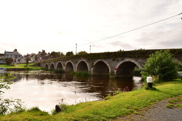 Fototapeta na wymiar Old stone bridge arches over river Barrow