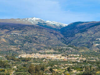 Fototapeta na wymiar view of Orgiva with Sierra Nevada in the background in the Alpujarra of Granada