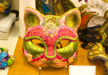 Venetian carnival masks at show case in Venice, Italy	