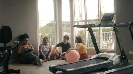 Group of friends exercise in the gym