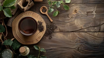 Foto auf Acrylglas tea ceremony in a cup with a teapot on a wooden background © Vahagn