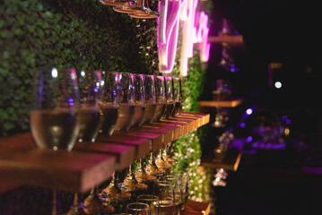 aligned wine glasses in a wedding reception