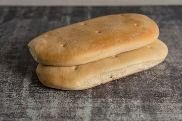 homemade bread ready to eat gray background