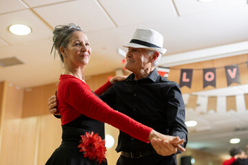 Senior couple dancing at dance studio