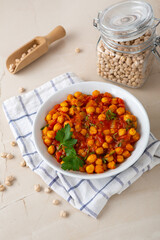 Overhead view of vegan curry dish with chick pea in bowl - 746070824