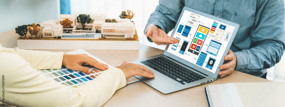 Poster cropped image of interior designer team recommends color by using color palette while laptop display