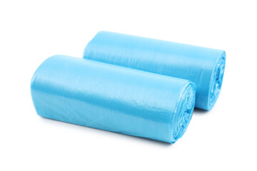 Two rolls of light blue garbage bags isolated on white