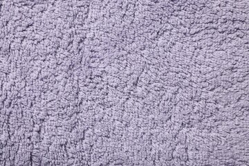 Texture of soft violet fabric as background, top view