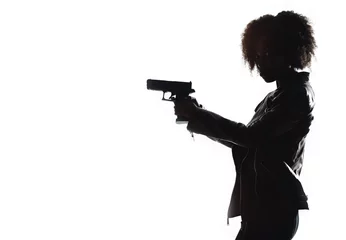 Foto op Aluminium Silhouette of a tough black woman holding a gun. Isolated white background with copy space. Private detective. Investigator. Mystery, thriller, action packed pose. Back light. African american woman. © ana