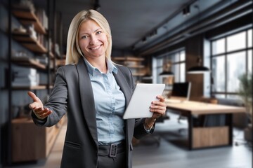 stylish professional woman CEO with digital tablet