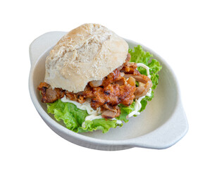 Fast food sandwich with chicken fried meat, mayonnaise cheese and vegetables in a porcelain bowl on a white background.