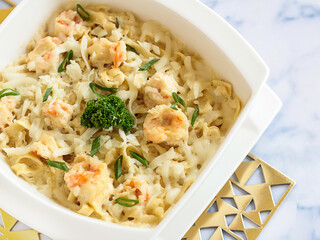 SHRIMPS FETTUCCINE with Cream Sauce Served in dish isolated on table closeup top view of italian food