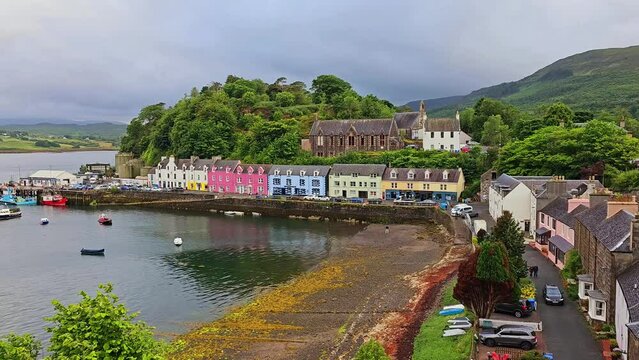 Pan over the coastal fishing village of Portree, Isle of Skye, Scotland