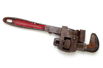 Old Rusted And Well Used Monkey Wrench Isolated On White