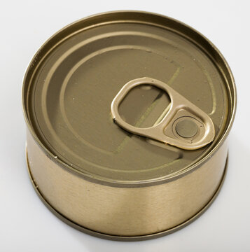 Close up of unlabeled yellow tin can