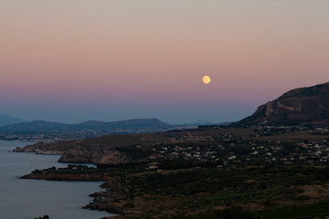 Panoramic picture with moon. Sunset on the paradise Mediterranean sea bay near Scopello - 746127895